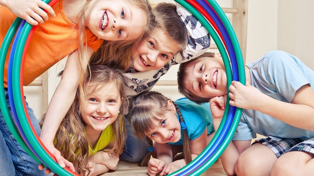 children with hula hoops for kid fit parties